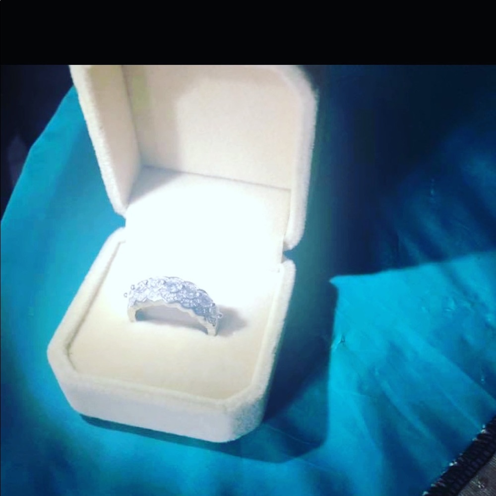 14 k white gold ring size seven with comfort fit.